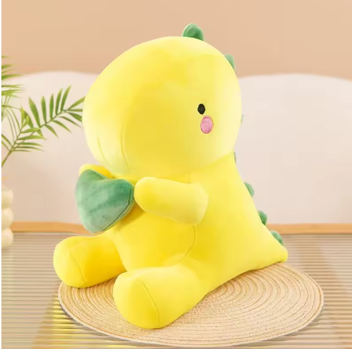 Someone holding the weighted dinosaur plushie